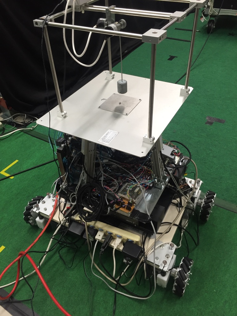 Omni-directional mobile robot with active vibration reducer
